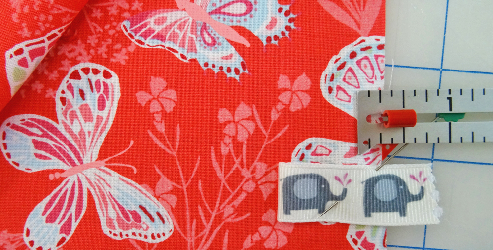 Place Ribbon Side Tag to avoid Seam Allowance